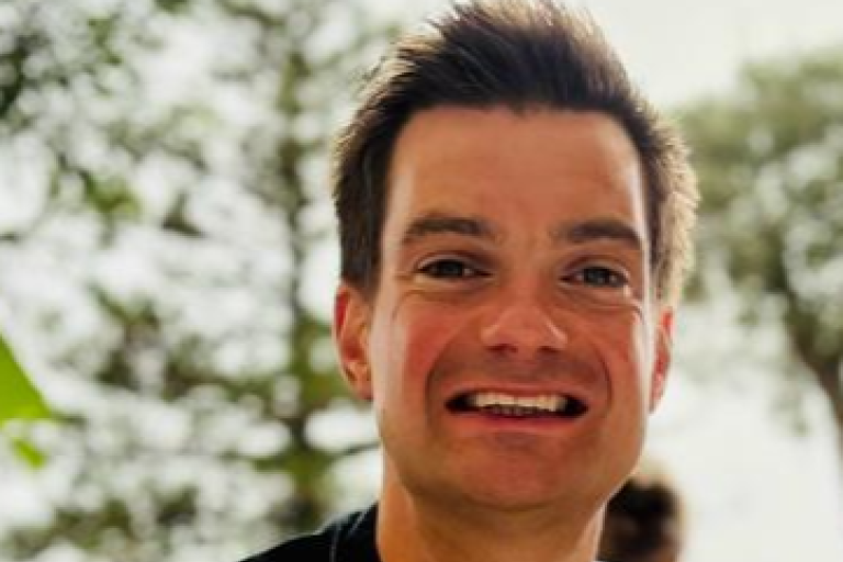 A man smiling.